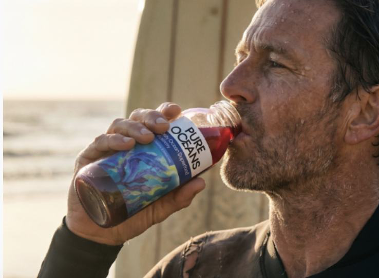 Drinking Pure Oceans on the shore